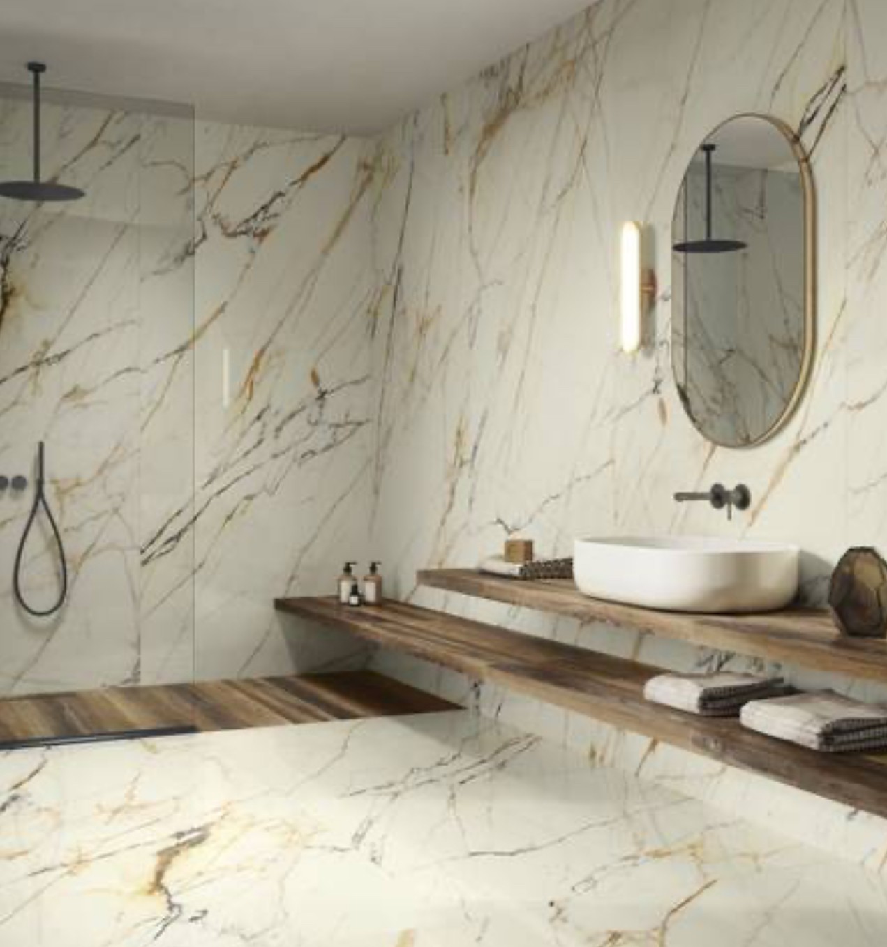 Calacatta marble bathroom floor tile installation in Ottawa by Orleans Flooring Co.