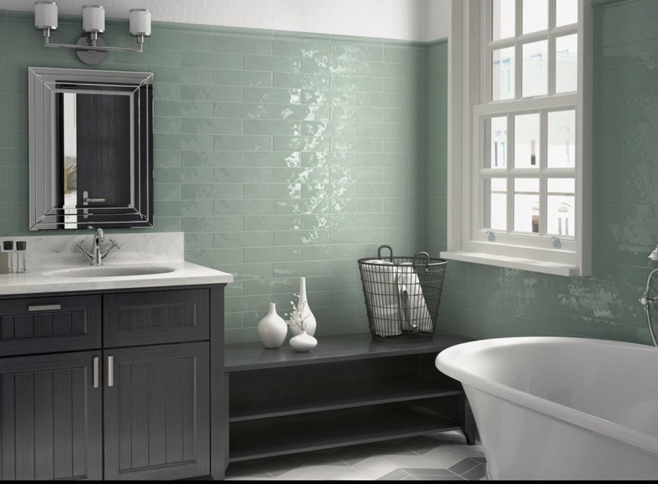 Sage green subway tile bathroom wall installation in Ottawa by Orleans Flooring Co.