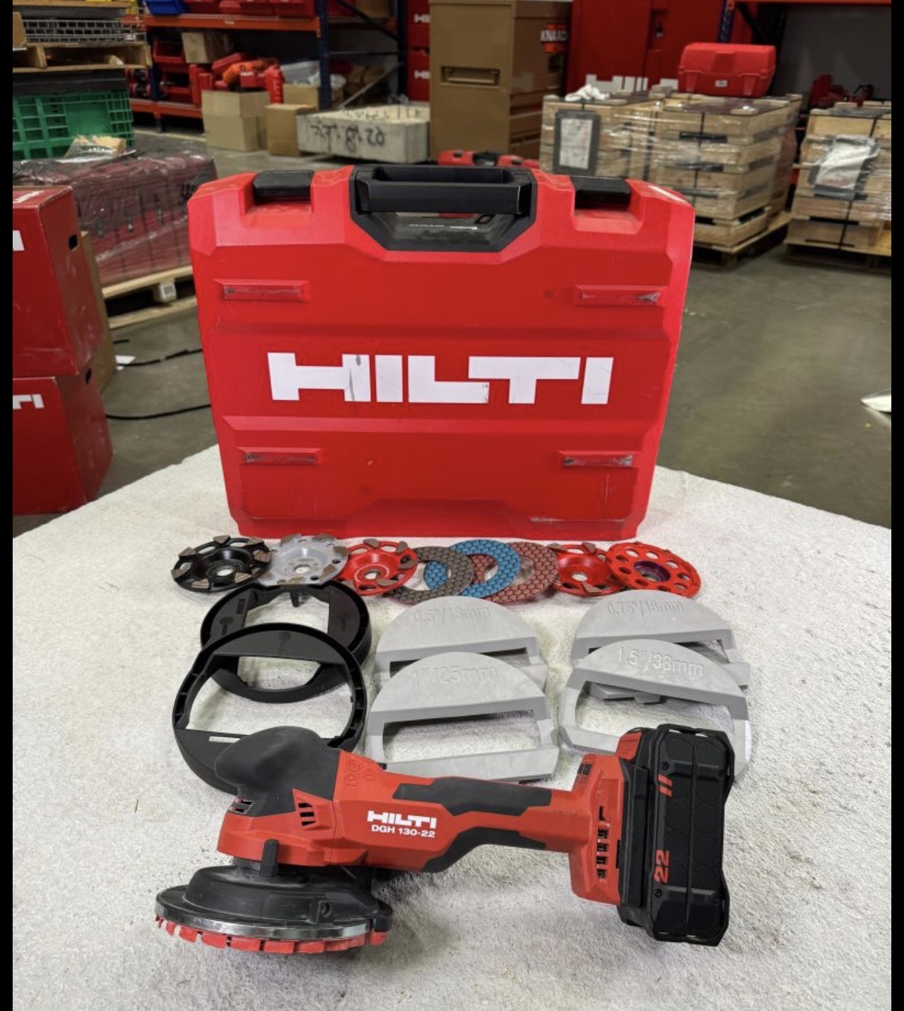 Hilti DGH130 angle grinder kit used for subfloor grinding and surface preparation by Orleans Flooring Co.